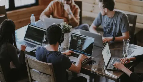 Developers working together on a mobile application